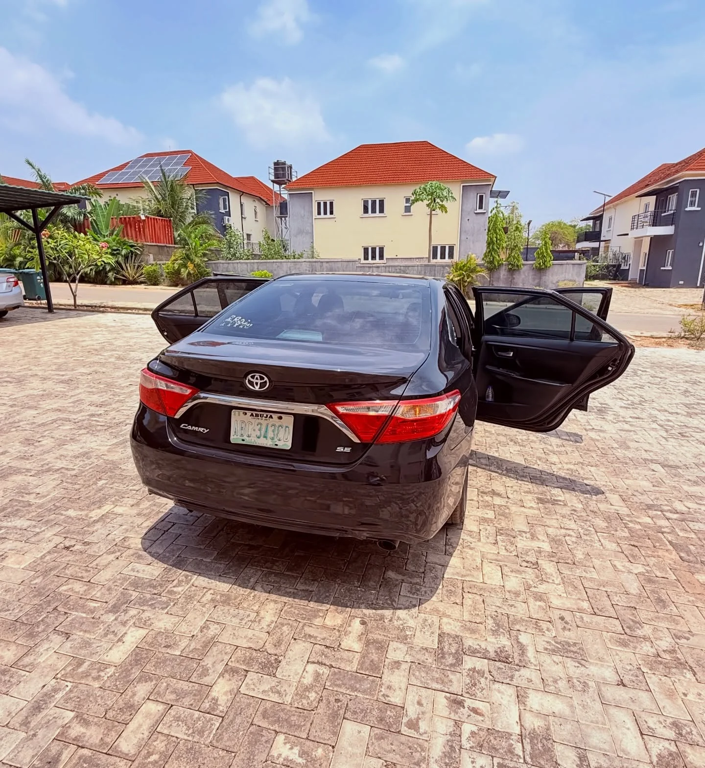 Real black Toyota Camry photographed for Kavod in Abuja